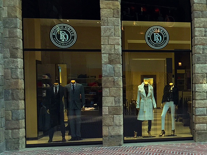 men and women collection displayed in rodeo facade